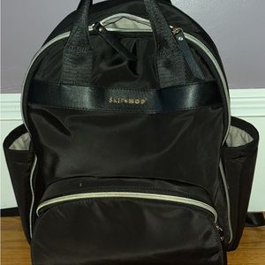 Skip hop diaper backpack. Great storage and easy to organize all the baby things